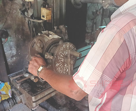 Shreeji Gears team discussing gear designs in Ahmedabad facility